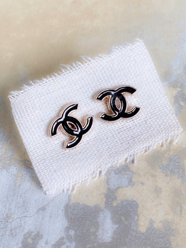 CC gold and black earrings