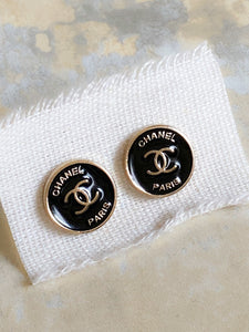 CC black button earrings