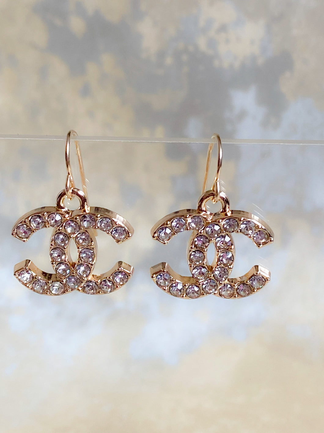 CC Sparkly Dangle Earrings
