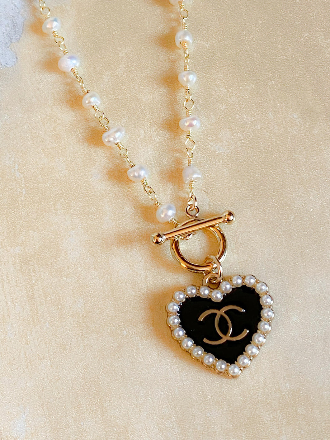 CC gold heart necklace with dainty pearls